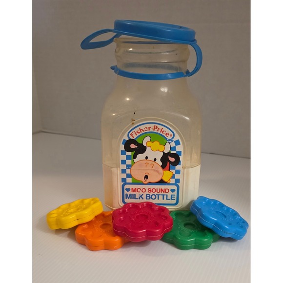 Vintage Fisher-Price Moo Sound Milk Bottle Toy w/ Shapes Preowned - Picture 1 of 11